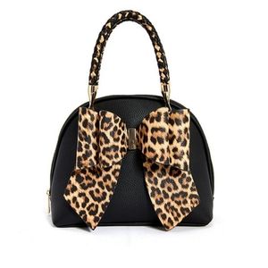 NWT LIKE DREAMS BLACK LEATHER CROSSBODY OR HANDBAG WITH  CHEETAH PRINT BOW